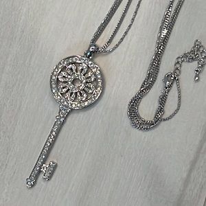 Crystal Key Silvertone Pendant necklace 32-34” Long